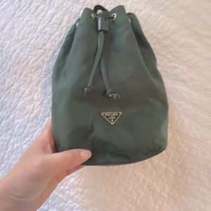 Prada Pouch. Authentic. Faded greens. Looks a little tie dyed. Great purchase !